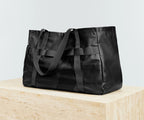 Angled view of the Active Tote 45L with the handles down