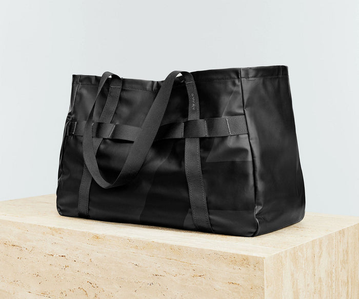 Angled view of the Active Tote 45L with the handles down