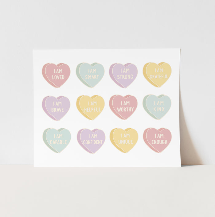 Motivational heart-shaped stickers with affirmations on a white background