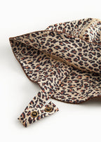 Child's swim cap with brown leopard pattern