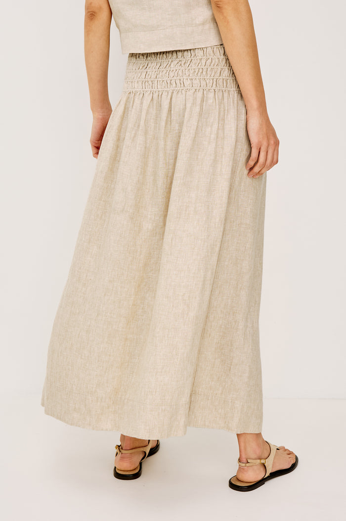 Wide Smocked Waistband and A-Line Silhouette in Heathered Flax Colorway - Lower Body Back View Featured on Model