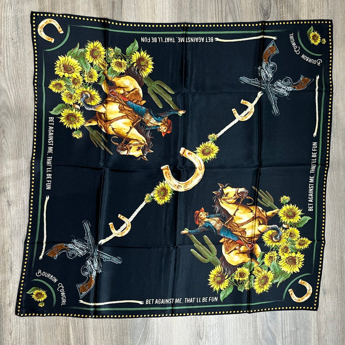 Black bandana with cowboy and floral design.