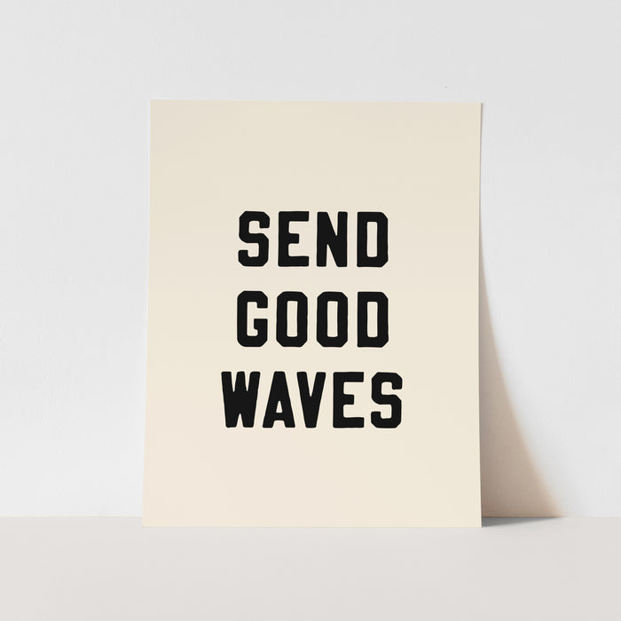 Beige greeting card with 'SEND GOOD WAVES' text on a light gray background