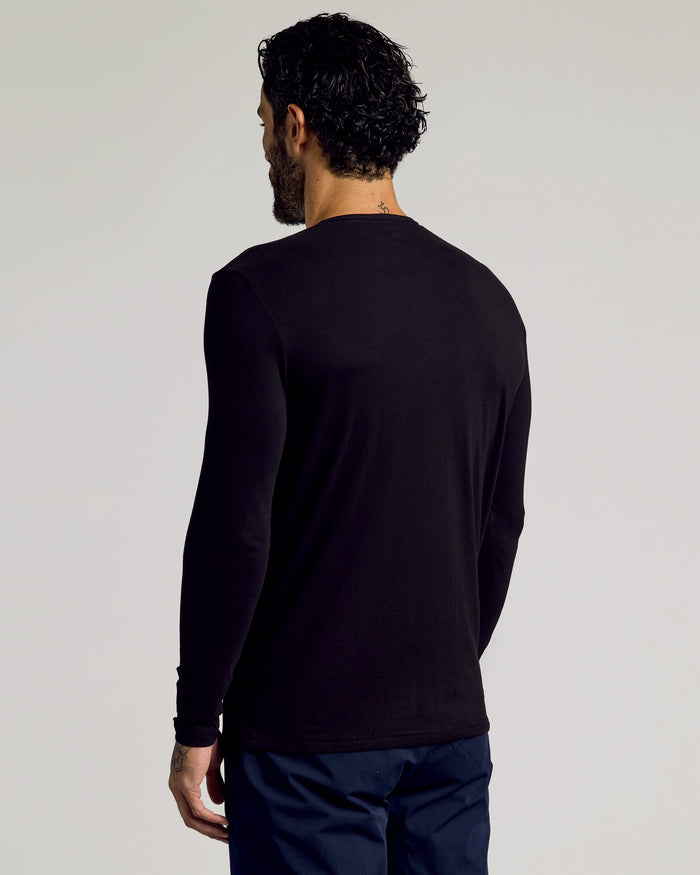 Black Tall Classic Long Sleeve Henley on man, showcasing fit and length.