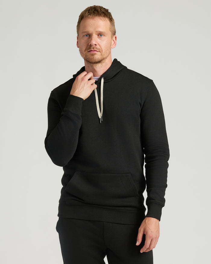 Black Tall Fleece French Terry Pullover Hoodie on male model, relaxed fit.