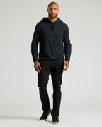 Model in All Black Classic Waffle Hoodie 3-Pack with trousers and sneakers.