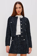 Capistrano Cropped Jacket in Denim Tweed Texture With Crew Neckline, Front Buttons, Buttoned Chest Pockets, and Long Sleeves in Denim Tweed Colorway - Upper Body Front View Featured on Model
