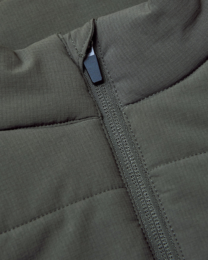 Carbon Puffer Vest with quilted stitching and central zipper.