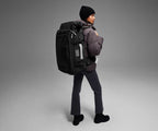 5'9" person wearing the 55L Boot Bag and winter clothes
// Model is 5’9”