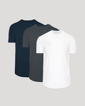 Three plain t-shirts in navy, gray, and white on a light gray background