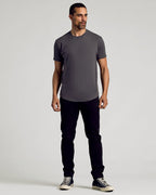 Carbon Curved Hem Classic Crew Neck on model with black pants and sneakers.