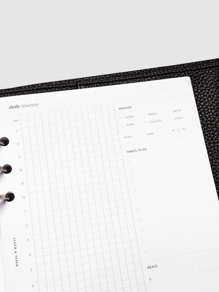 Insert in use inside a black leather folio.