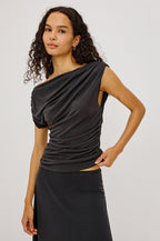Dominic Top in Soft Jersey With Off-The-Shoulder One-Shoulder Design, Shirred Shoulders, and Ruched Waist in Ash Colorway - Upper Body Front View Featured on Model