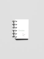 Dossier Planner Dashboard in Pocket size shown ring bound.