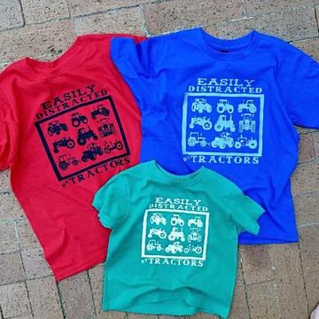 Easily distracted by Tractors tee Red Blue Green kids