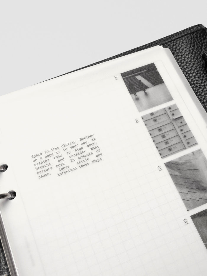 A5 Editorial Vellum Dividers Vol. 2 shown flat with minimal desk accessories.