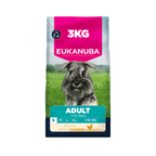 A 3 kg bag of Eukanuba Adult dog food for dogs, featuring a Schnauzer on a green grassy field. The packaging has a bright pink top section with white text, a teal band with product details, and a dark blue base.