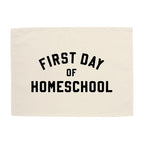 Beige cloth with 'First Day of Homeschool' text on a white background