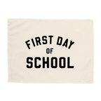 Canvas banner with 'First Day of School' text on a white background