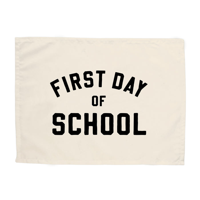 Canvas banner with 'First Day of School' text on a white background