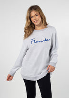 Florida Gators Women's Heather-Grey Relaxed, straight Yarn-dyed brushed fleece Sweatshirt with the look of sweater, the touch of a blanket, crew neckline and ribbed neck, cuffs and hem