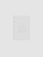 Light grey, semi-transparent, and glossy plastic planner dashboard with organic raised shape design in size CP Petite on a neutral background.