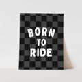 Checkered card with 'Born to Ride' text on a light gray background