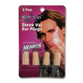 Image of steve vai ear plugs made by hearos against white background. There are two pairs of tan ear plugs in a red package with a photo of steve vai's face on it. the top says 2 pair, then it has the steve vai logo of an upside down triangle, a right side up one, and a line going across the triangles with a curl at the end next to the triangle that is upright. below that says steve vai earplugs in white text.