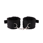 Two black plush-lined cuffs linked by a short chain and clip.