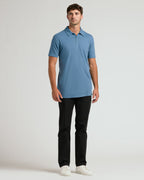 Indigo Short Sleeve Tall Polo on tall model, showcasing fit.