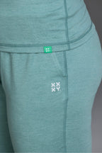 Teal leggings with a brand logo on a plain background || Underseas
