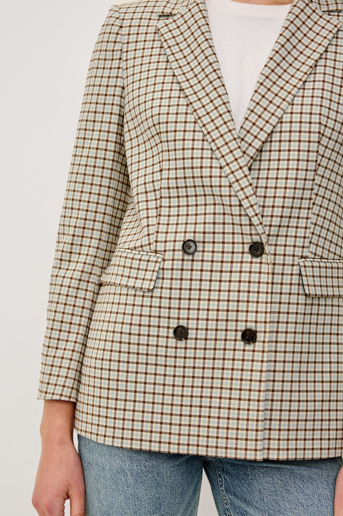 Jac Double-Breasted Blazer With Notched Lapels Side Flap Pockets and Full Lining in Blue Bay Check Clorway - Upper Body Close Up View Featured on Model