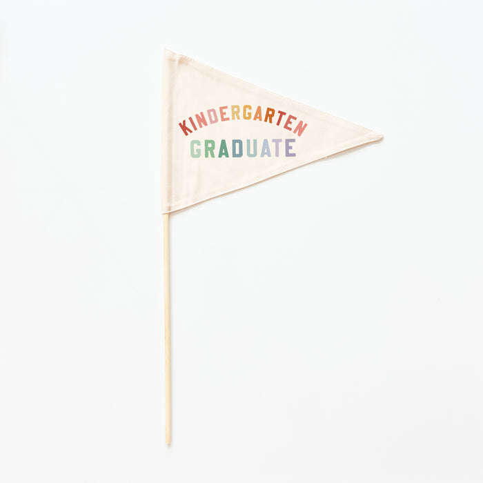 Triangular flag with 'Kindergarten Graduate' text on a white background