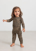 Girl in leopard print jumpsuit