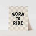 Checkered card with 'Born to Ride' text on a light gray background