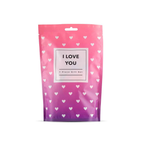 Front view of a pink and purple bag with a white heart pattern, labeled "I LOVE YOU 7 Piece Gift Set."