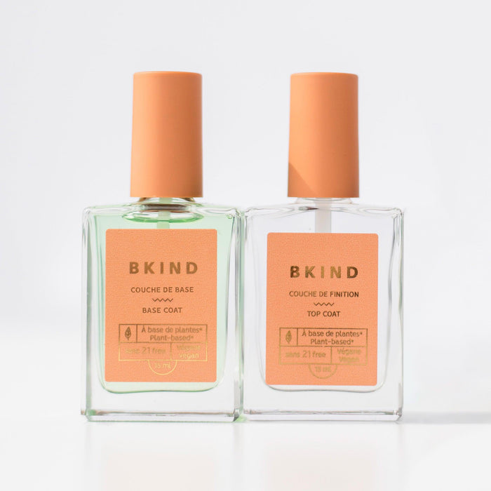BKIND base and top coat bottles – Calgary vegan nail polish essentials for long-lasting, plant-based manicures.