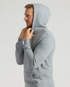 Side-profile of man wearing Medium Heather Gray Tall Fleece French Terry Pullover Hoodie.