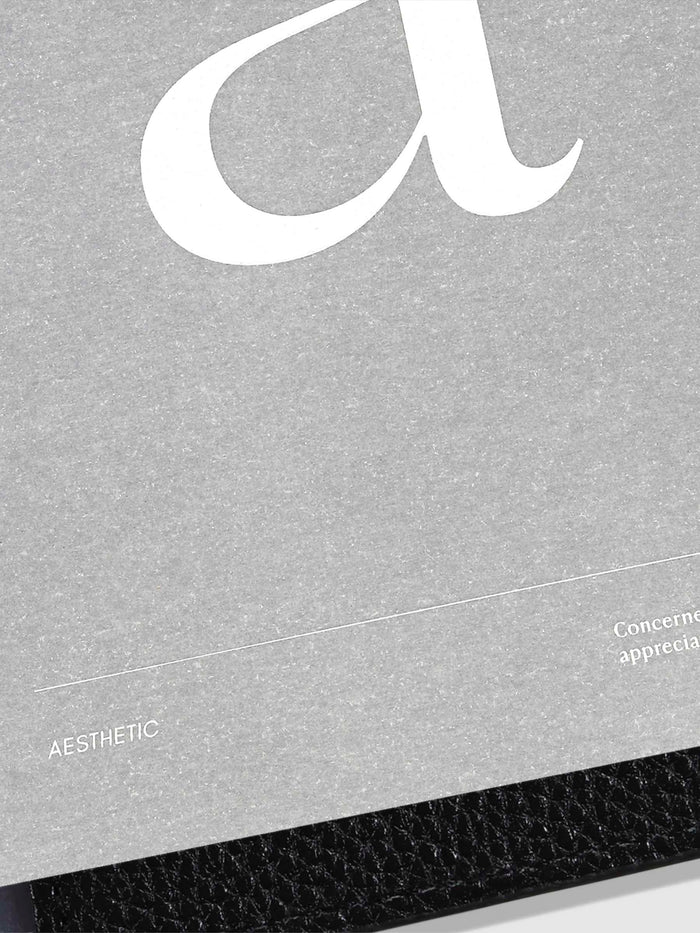 Close up of a Monogram Vellum Planner Dashboard A in use in a leather planner.