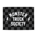 Checkered flag with 'Monster Truck Society' text and lightning bolts on a white background