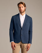 Navy Comfort Knit Blazer worn in a modern business-casual style.