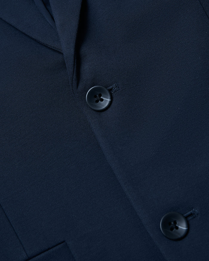 Navy Comfort Knit Blazer with textured fabric and tailored lapel.