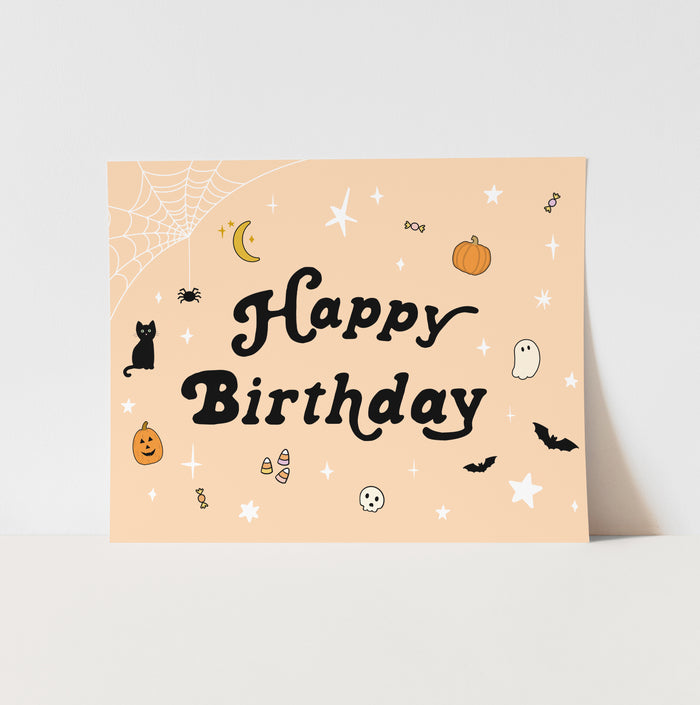 Halloween-themed birthday card with illustrations on a beige background