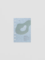 Blue speckle cardstock planner dashboard with organic shape design flocked in blue-green with text design shown in A6 size.