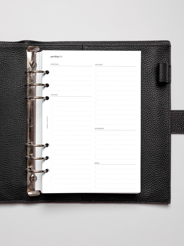Insert in use inside a black leather planner.