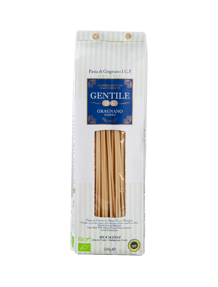 Packaging of Gentile Pasta di Gragnano IGP - Bucatini, showing the pasta through a clear window, with the brand 'Gentile' and 'Pasta di Gragnano' visible on the label.