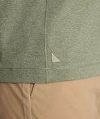 Model is wearing UNTUCKit Clarendon II in Olivine.