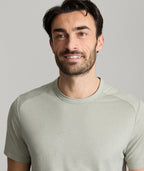 Model is wearing UNTUCKit Clarendon performance tee in shadow.