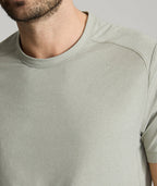 Model is wearing UNTUCKit Clarendon performance tee in shadow.