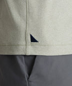Model is wearing UNTUCKit Clarendon performance tee in shadow.